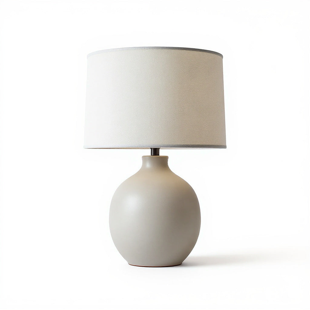 Angle view of the lamp highlighting the linen shade and ceramic base 3