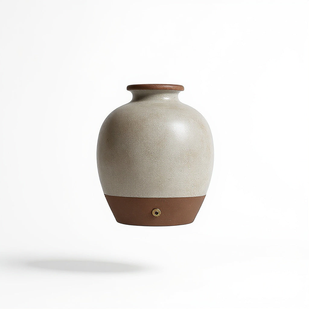 Back view of stoneware table lamp showcasing its antique brass details 2